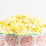 A bowl of creamed corn.