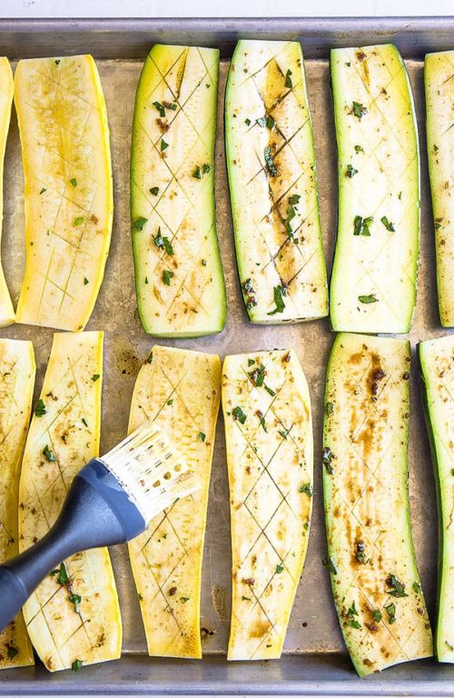Shallow slits in zucchini and squash allow the marinade to soak deep into the flesh, adding more flavor. #grilledvegetables #vegetablemedley #mixedvegetables #sidedish #potluck #busycooks