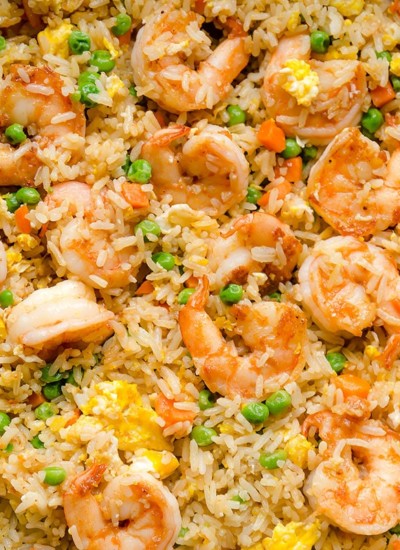 Faster than take-out, this spiced shrimp fried rice is so flavorful and easy to make! Everyone loves it, even the picky eaters! #friedrice #shrimp #shrimpfriedrice #quickdinner #easyrecipe #busycooks