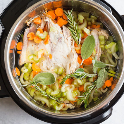 Learn my #1 secret for the most nutritious and flavorful Instant Pot Chicken Stock and make it in half the time it takes on stove top. This extra rich and flavorful chicken (or turkey) stock will be your secret ingredient for some many dishes, especially chicken noodle soup! #InstantPot #InstantPotRecipes #chickenstock #instantpotchickenstock #turkeystock