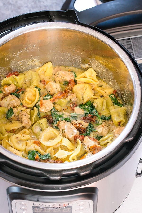 Cooked creamy Tuscan tortellini in an Instant Pot. 