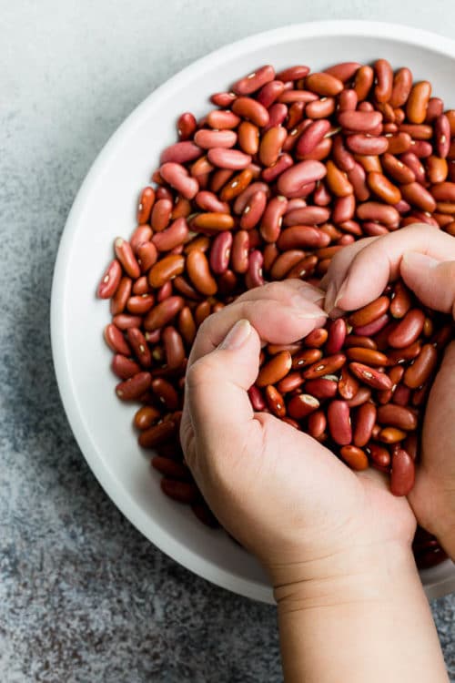 Everything you need to know about cooking with dried beans. Learn about the benefits of beans, different varieties, how to cook and store beans and more! #driedbeans #beans