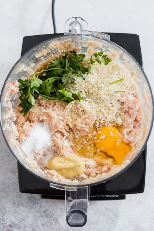 Bacon chicken meatballs ingredients in a food processor. 