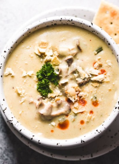 This super easy oyster stew is thick, creamy and rich! While most oyster stew recipes don't call for potatoes, we find ours even better with it. #oysterstew #seafood #seafoodstew