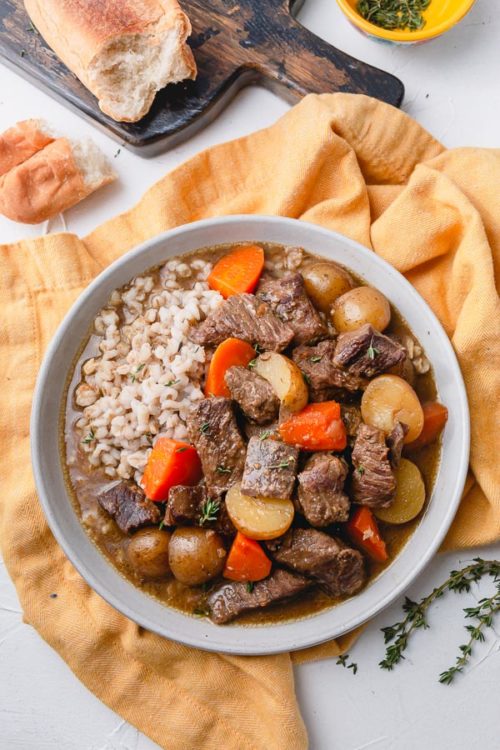 This Instant Pot beef stew is a rich and hearty comfort meal in less than 90 minutes and very minimal hand-0n time! The secret ingredients makes this stew extra-hearty! #instantpotbeefstew #beefstew