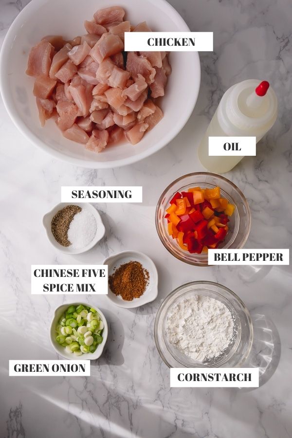 Ingredients in individual bowls for salt and pepper chicken recipe.