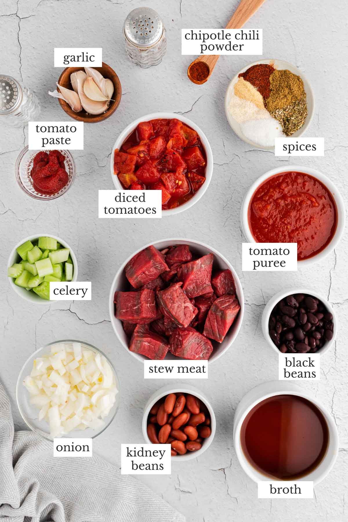 Chunky chili ingredients in individual bowls.
