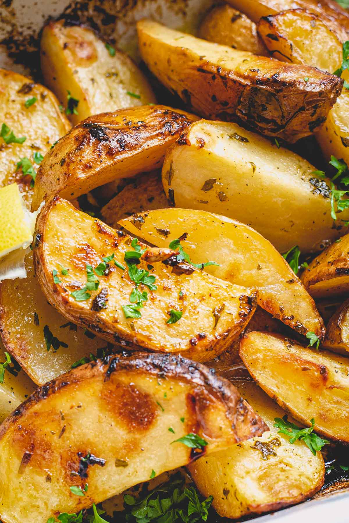 Close-up photo of roasted lemon potatoes.