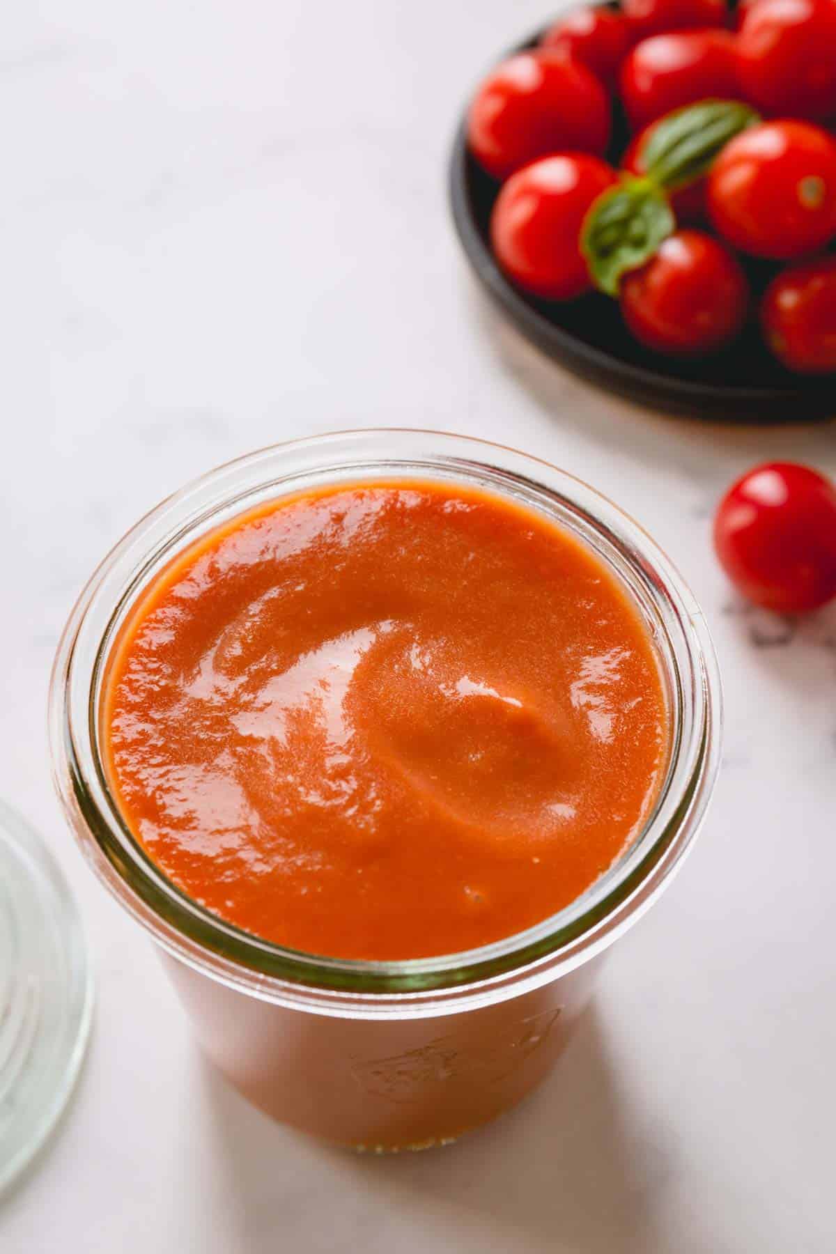 a jar of cherry tomato sauce