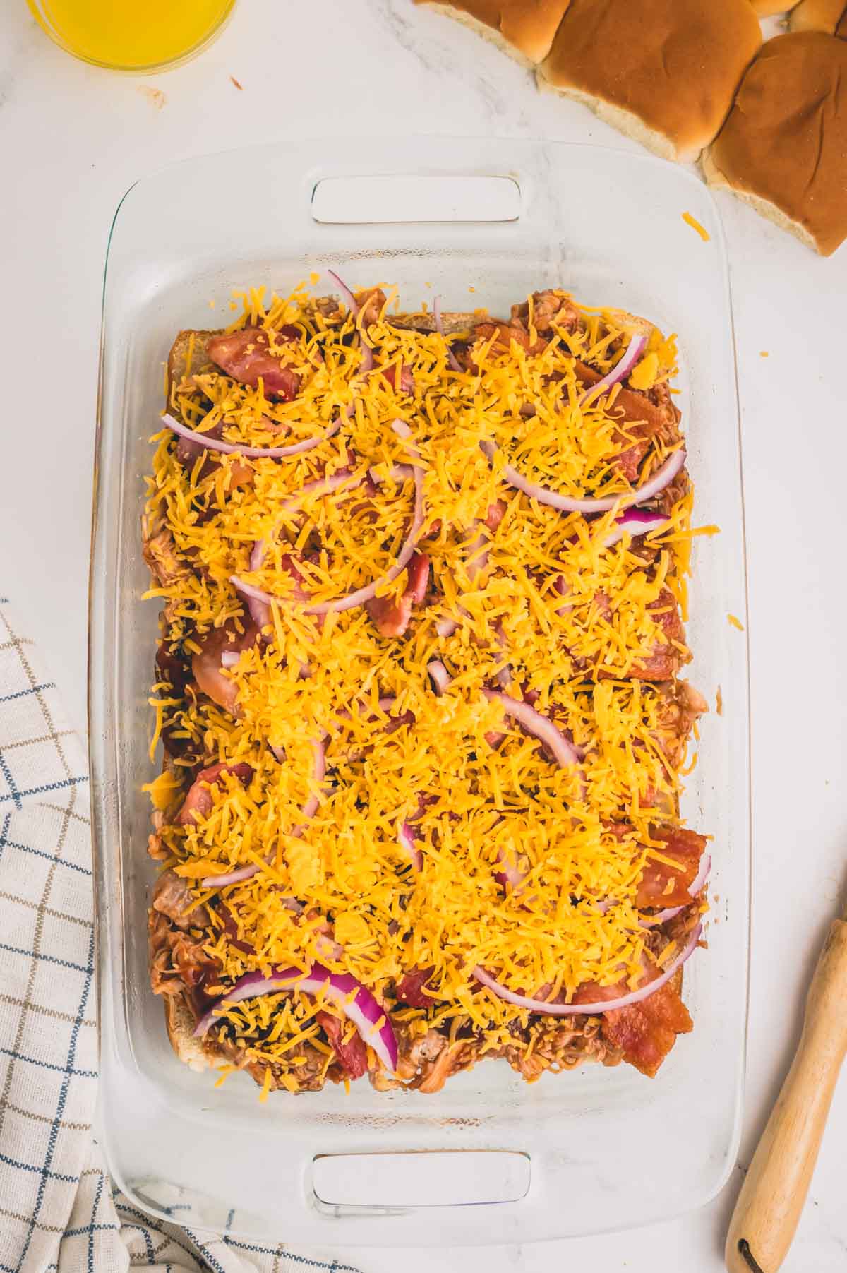 Shredded cheese sprinkled all over the bbq chicken mixture.