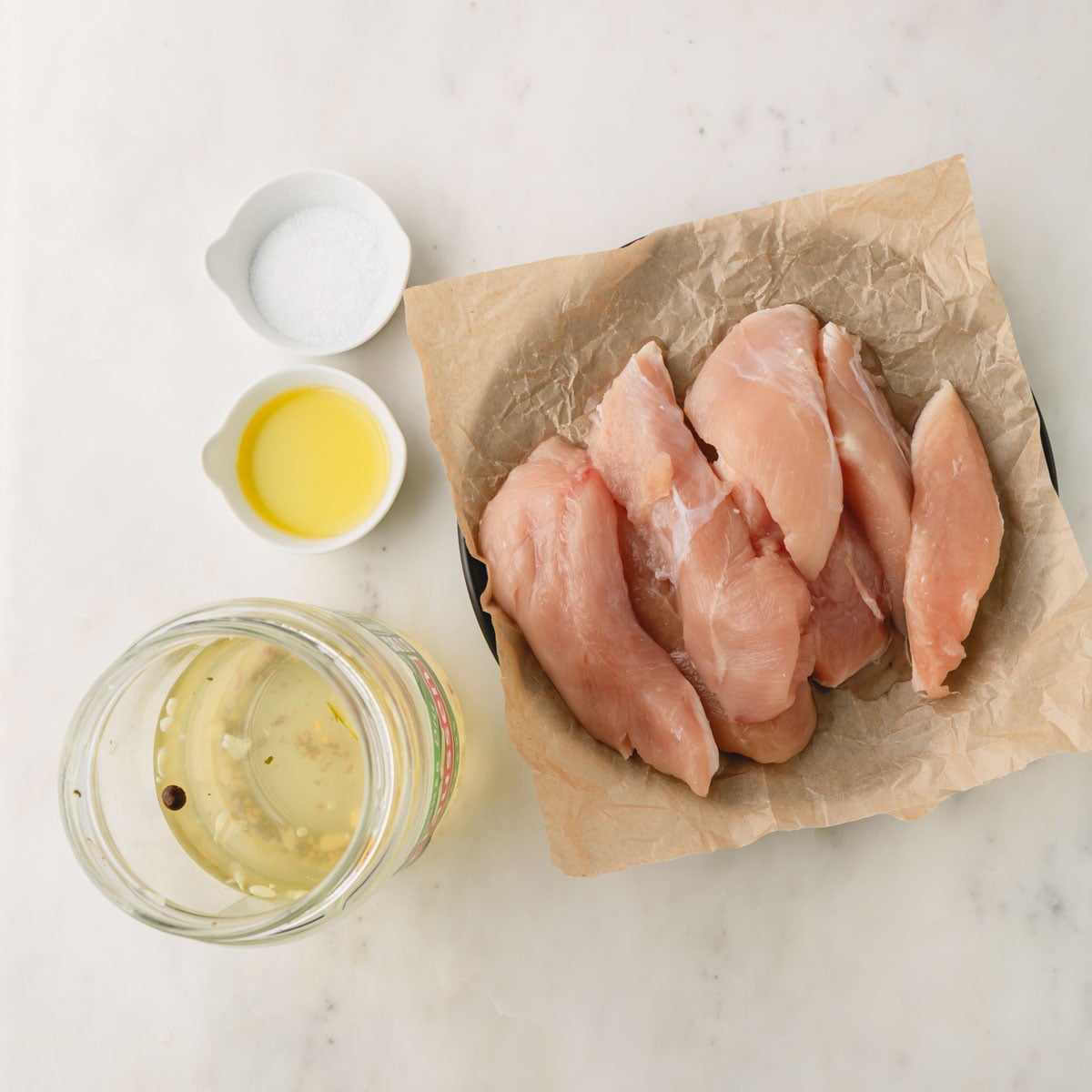 Pickle brined chicken ingredients in individual bowls.