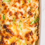 Cooked chicken bacon ranch casserole in a casserole dish.