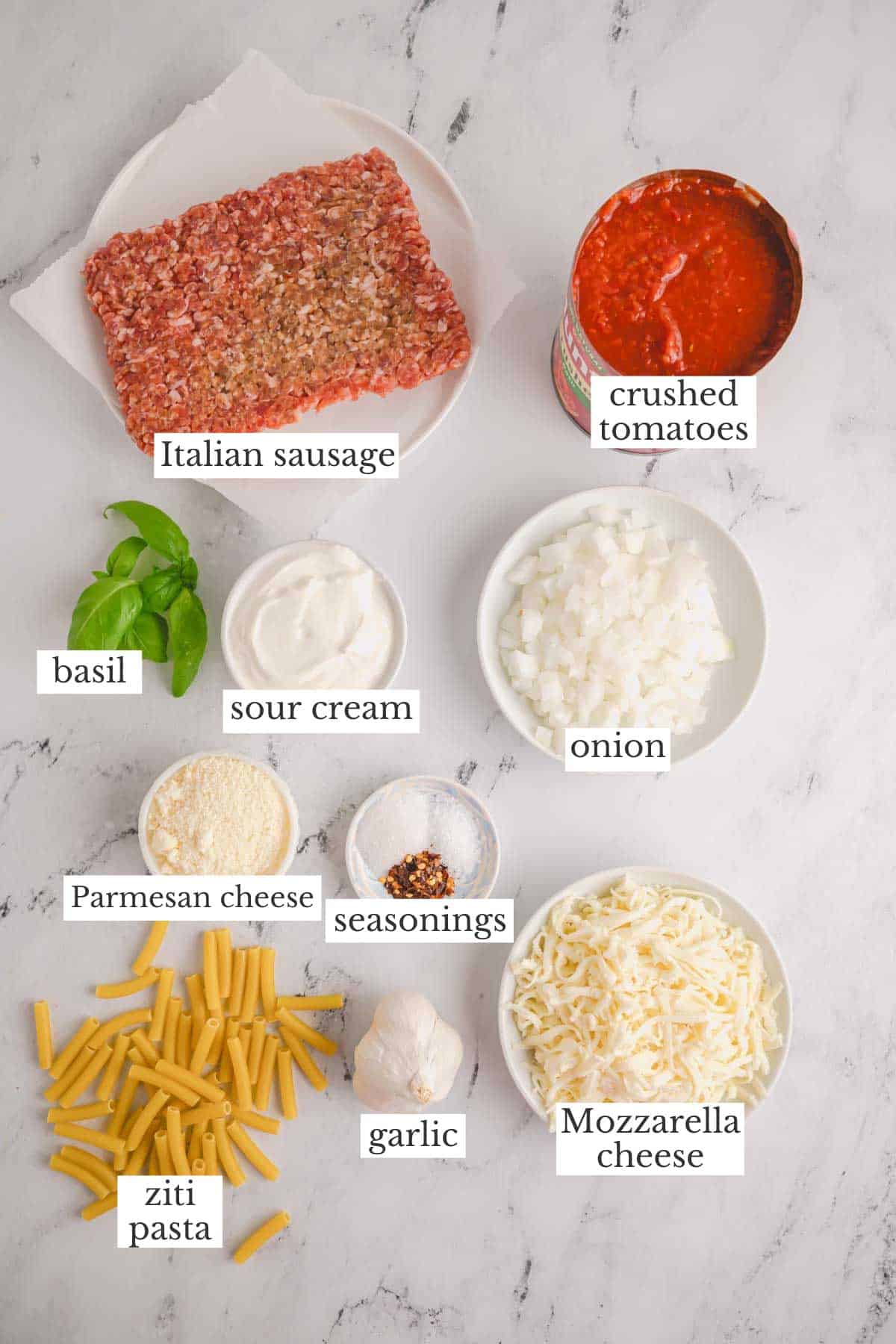 Ingredients needed to make an easy baked ziti recipe.