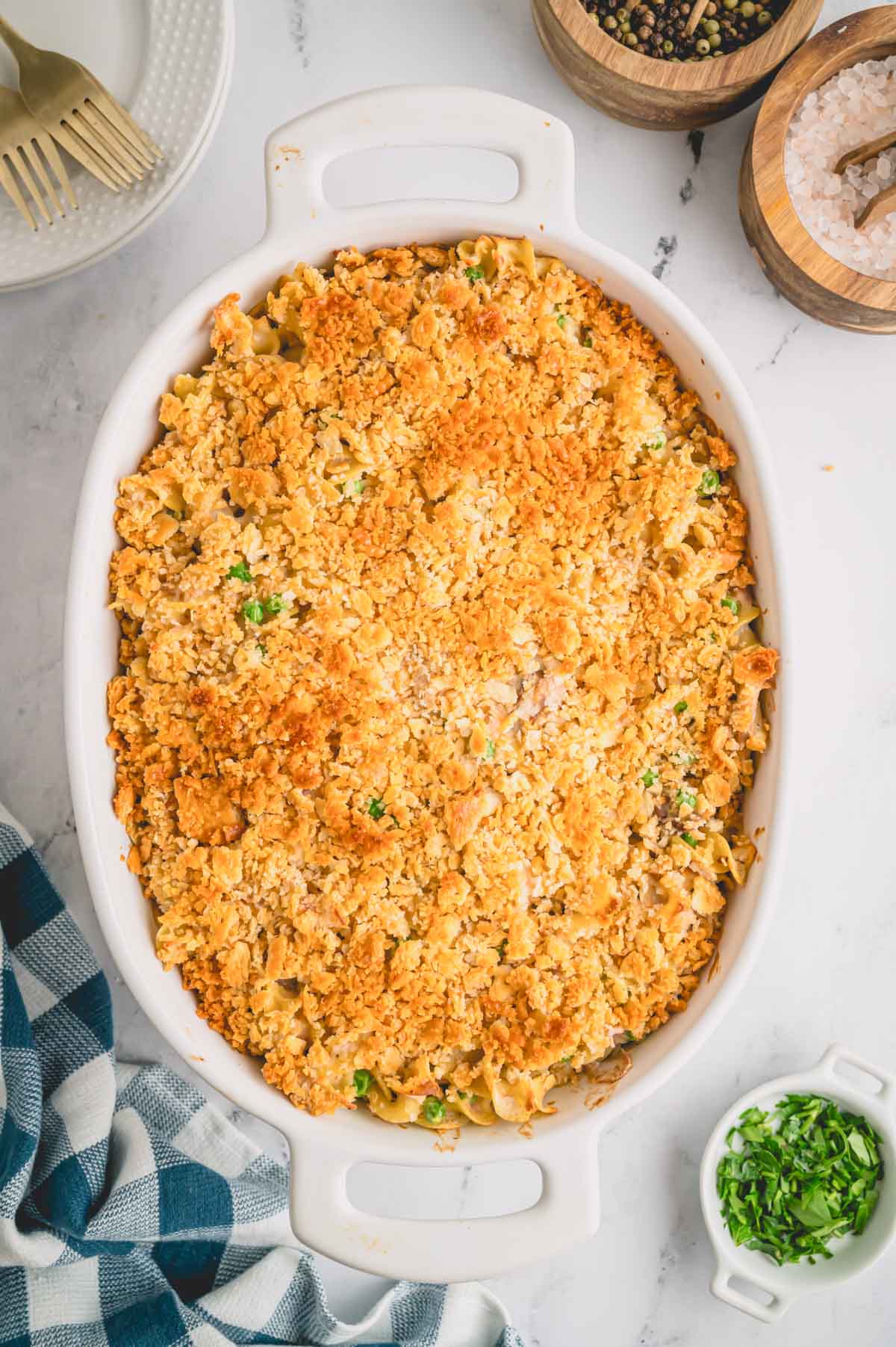 Overhead image of a baked tuna casserole topped with a cracker topping.