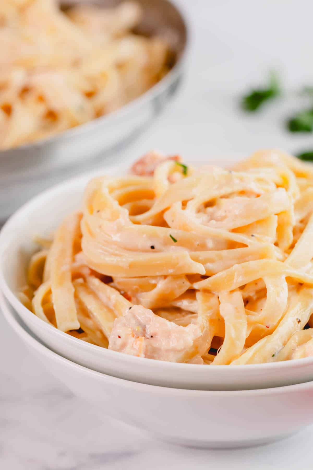 A bowl of smoked salmon fettuccine.