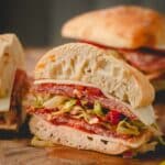 Italian sandwiches with grinder filling, meat, and cheese.