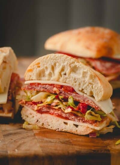 Italian sandwiches with grinder filling, meat, and cheese.