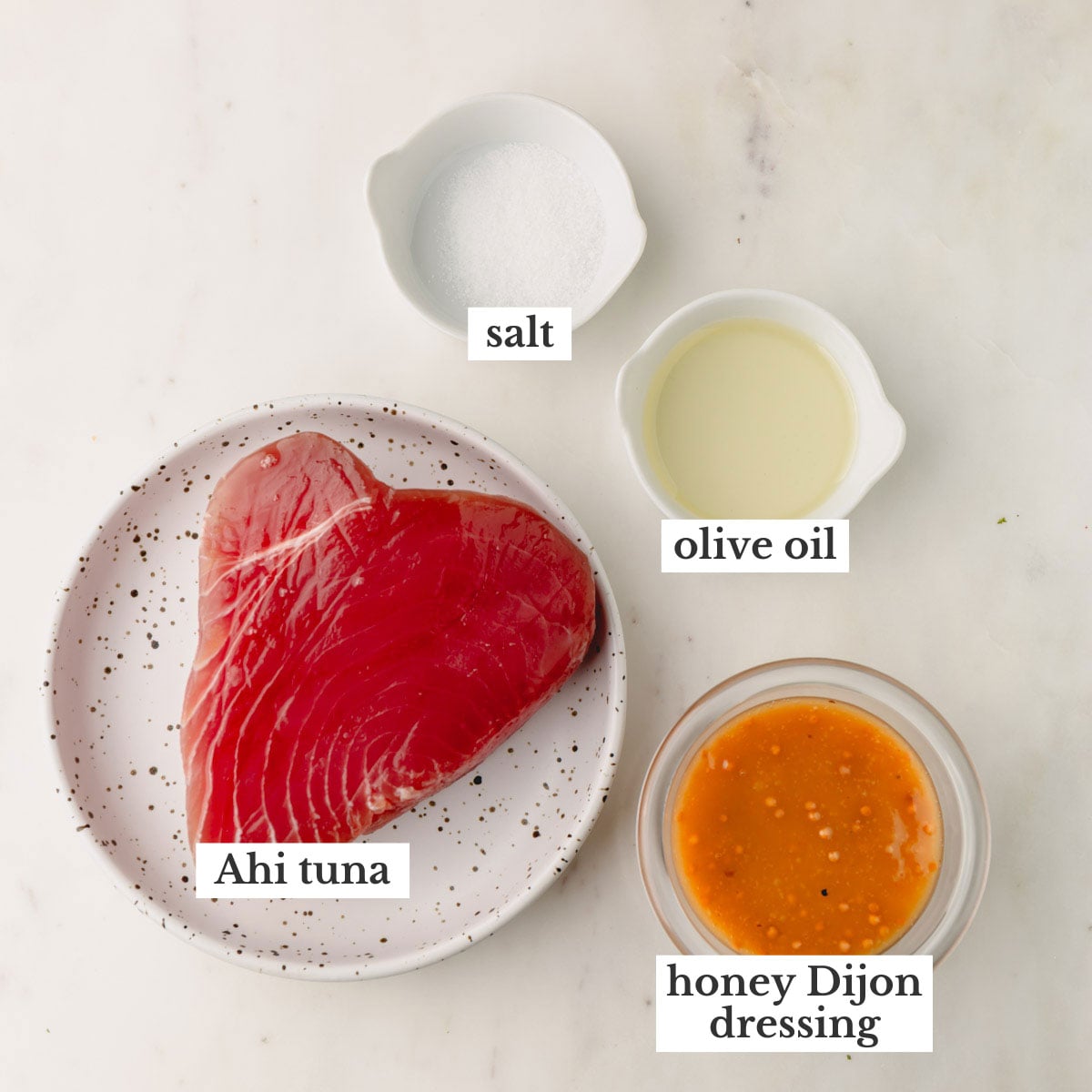 Ahi tuna, salt, olive oil, and honey Dijon dressing.