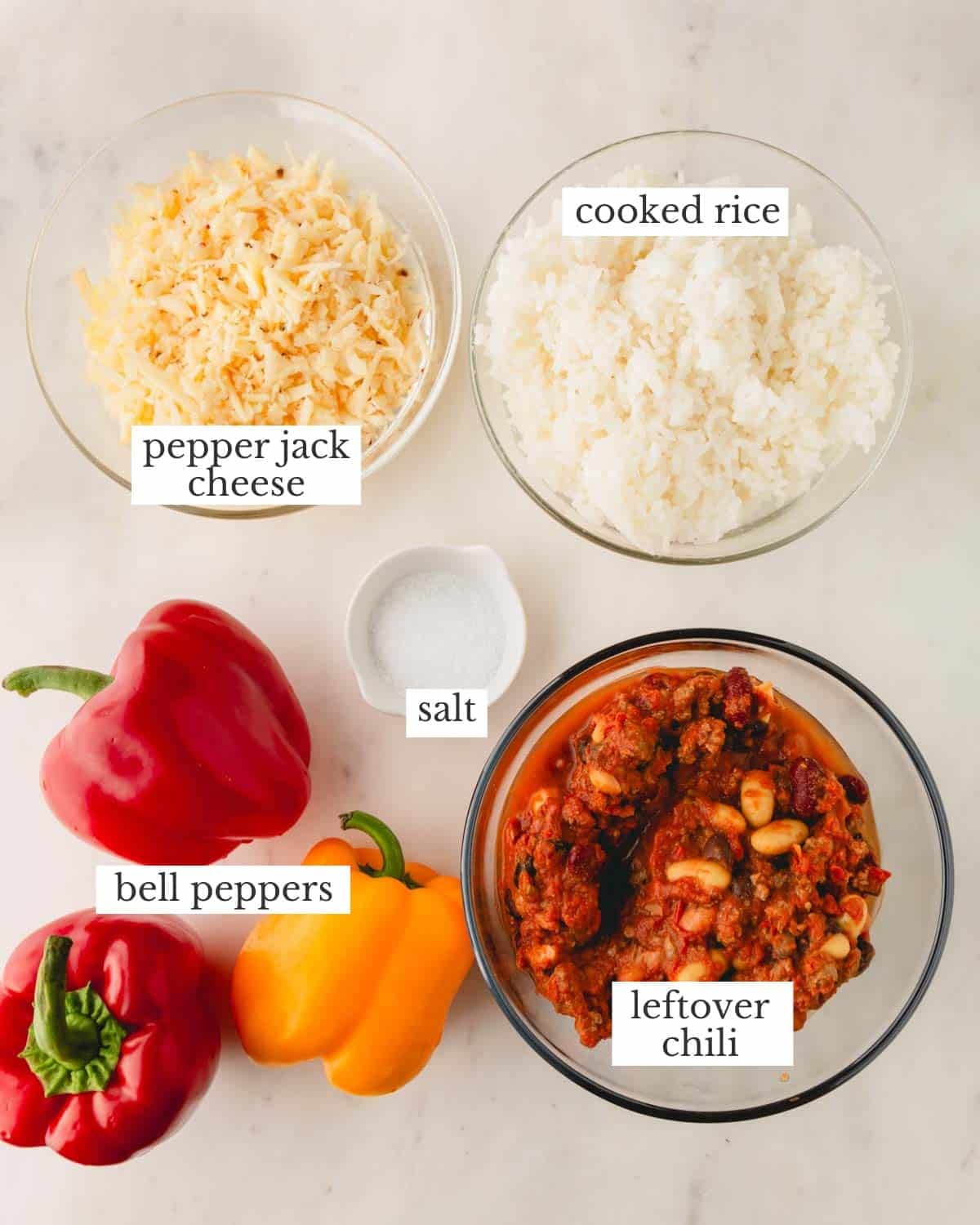 Pepper Jack cheese, cooked rice, chili, bell peppers, and salt to make stuffed peppers.