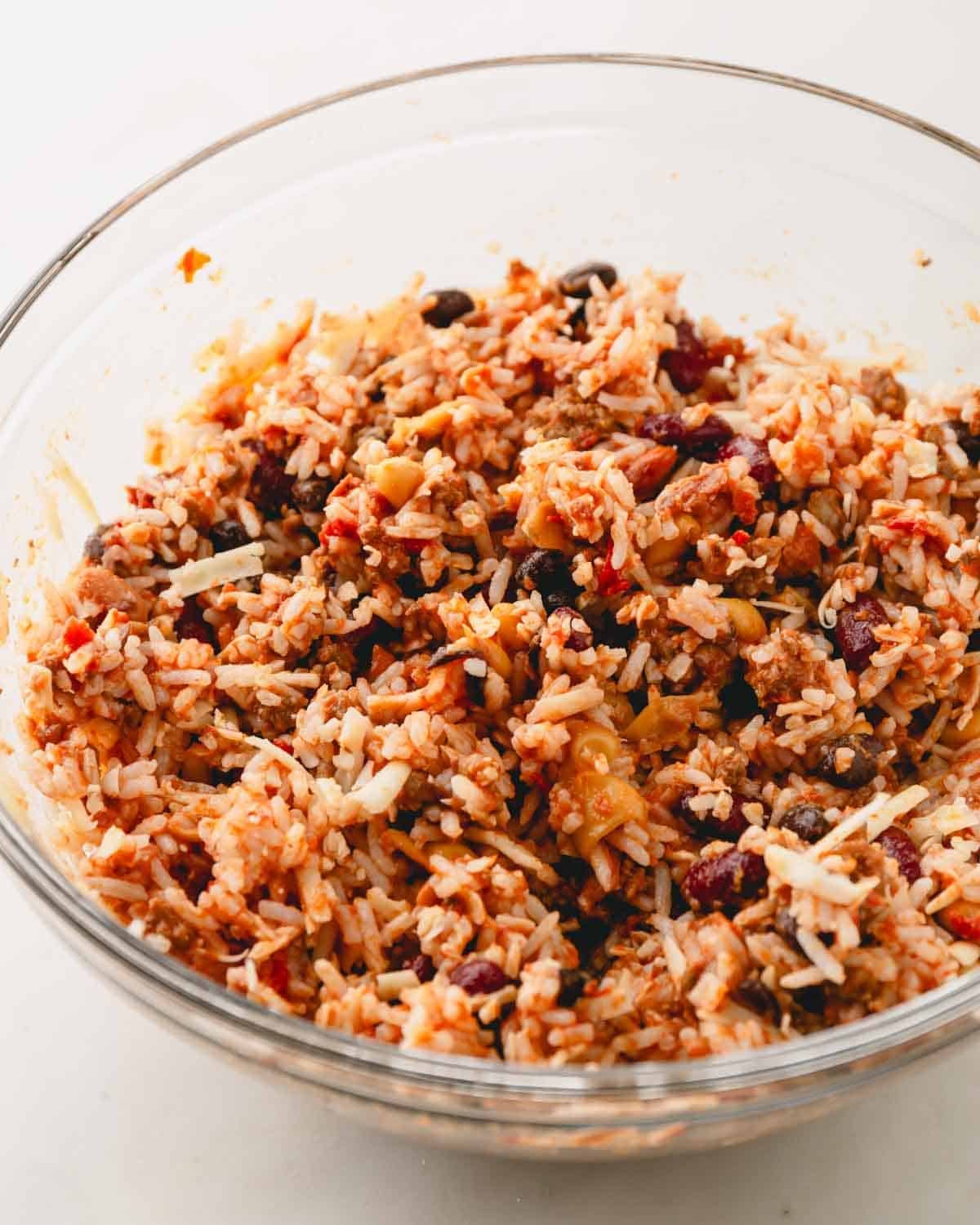 A bowl of mixed rice and chili.