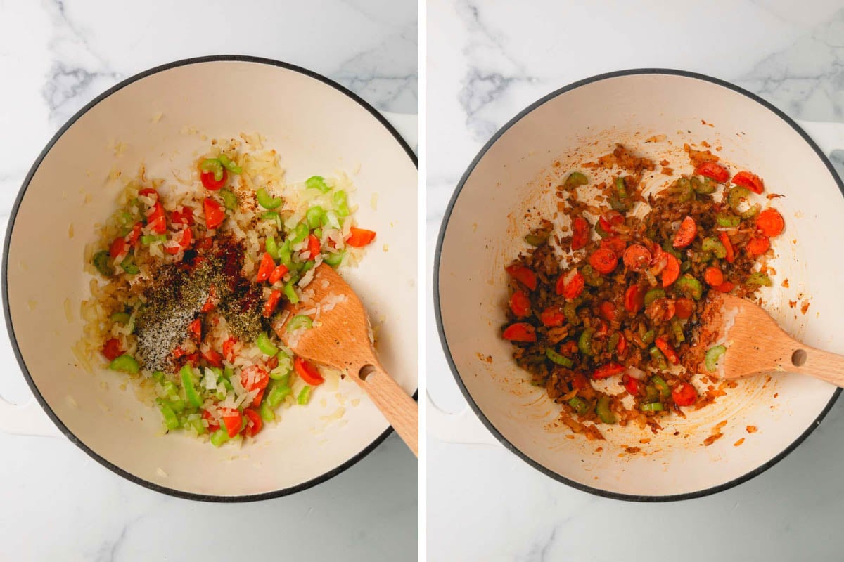 The big white pot on the left has the softened vegetables with the spices sprinkled over the top. The pot on the right has the spices cooked with the vegetables. Both pots have a large wooden spoon in them.