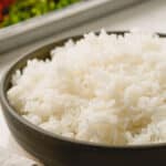 A bowl of cooked white rice.