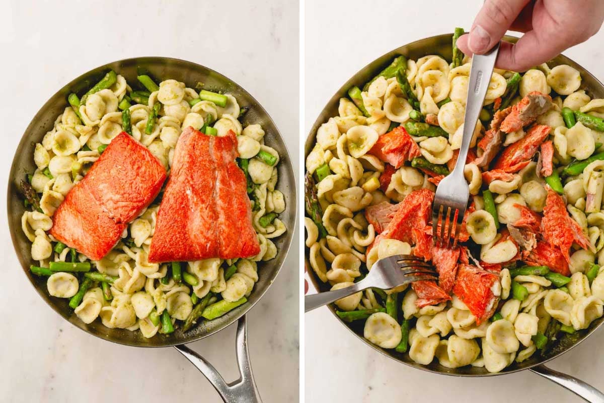 The image on the left is the cooked salmon fillets on top of the finished pesto pasta in a stainless skillet. The image on the right is the pesto pasta in a skillet with the salmon being flaked into large chunks with two forks held by a hand.