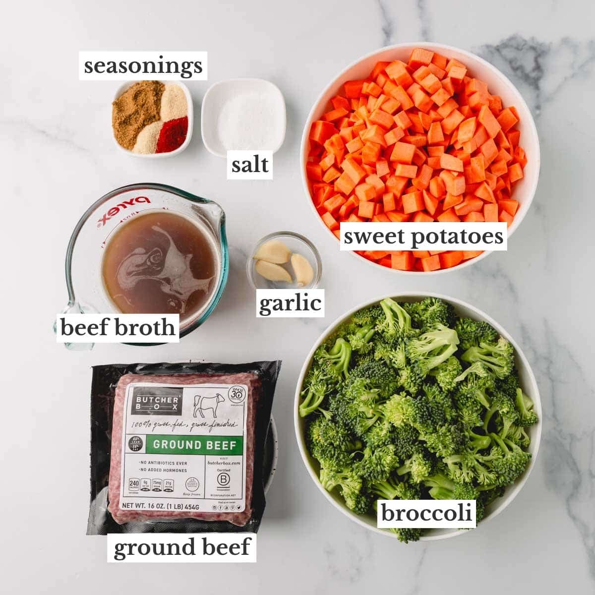 Ingredients for ground beef and sweet potatoes. The ingredients include seasonings like smoked paprika, cumin, garlic powder, and onion powder. Also salt, sweet potatoes, beef broth, garlic, broccoli, and ground beef.
