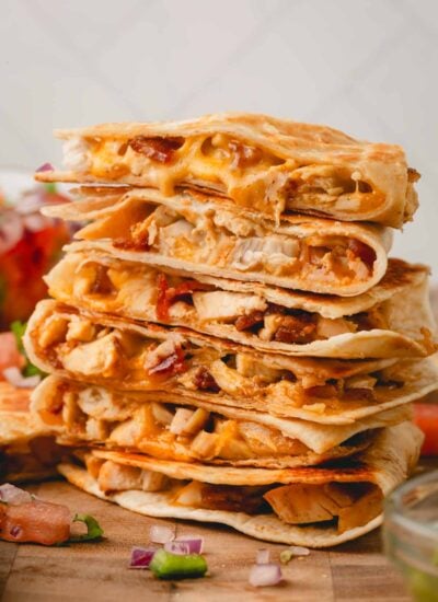 Chicken bacon ranch quesadillas stacked on top of each other.