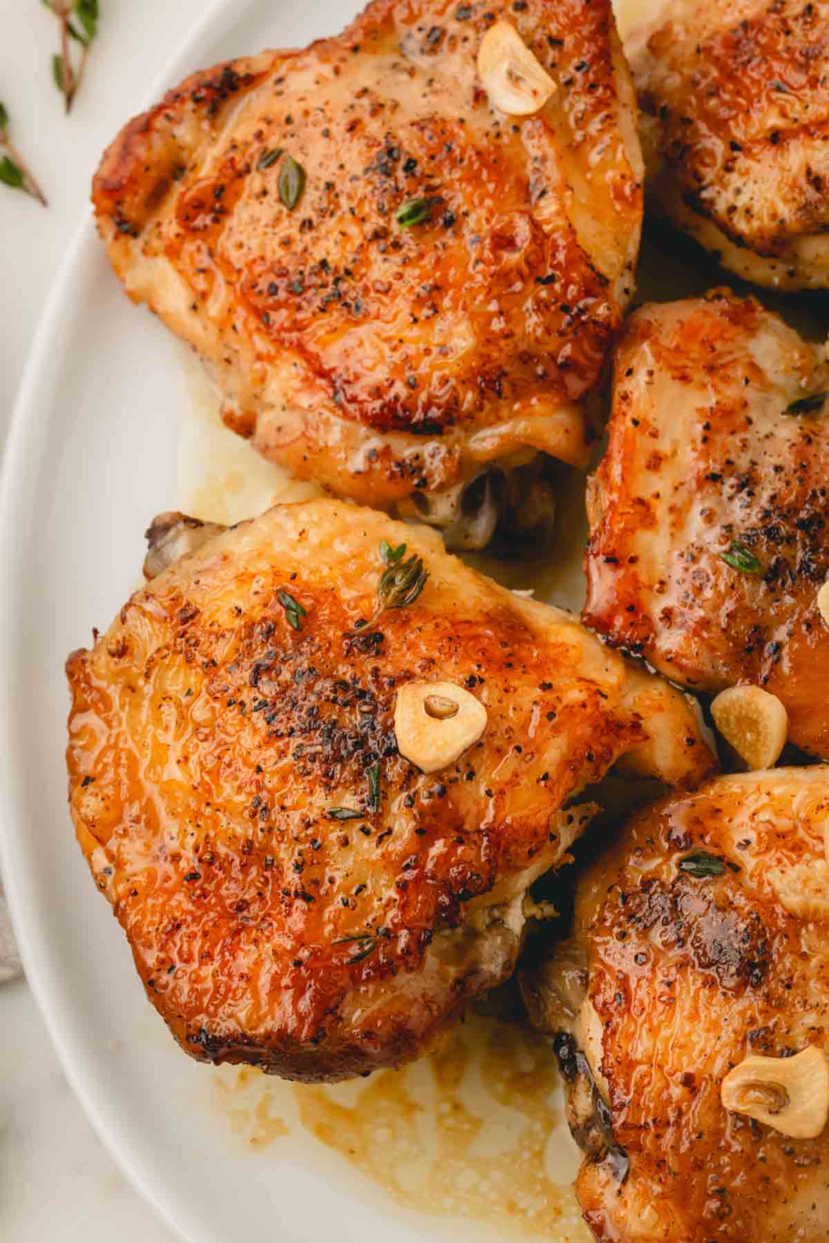 Closeup image of garlic butter chicken thighs.