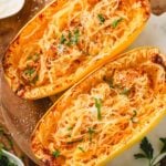 Air fryer spaghetti squash on a cutting board.