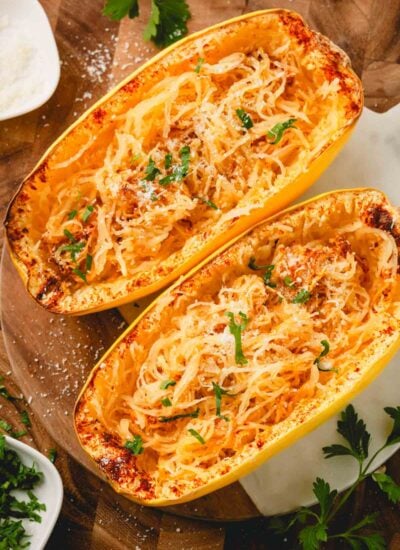 Air fryer spaghetti squash on a cutting board.