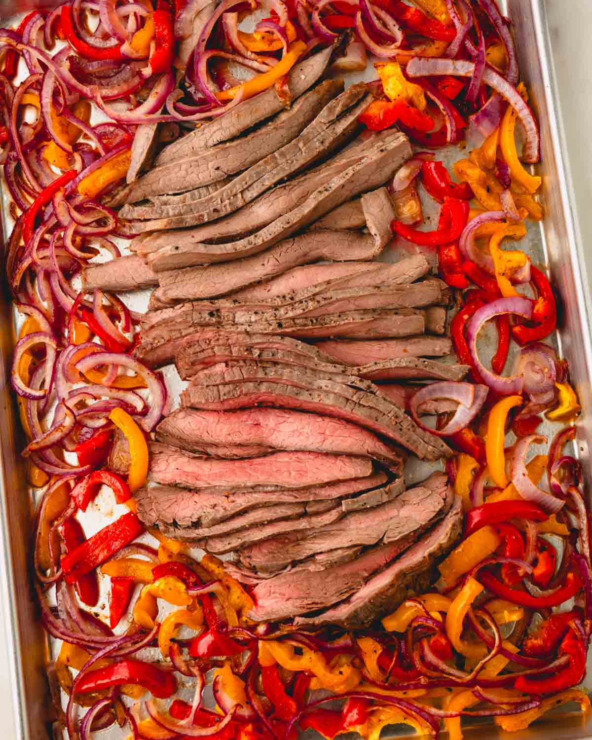 Over head image of sheet pan fajitas.