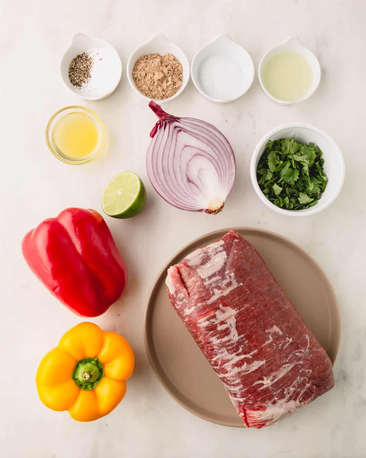 Ingredients for sheet pan steak fajitas.