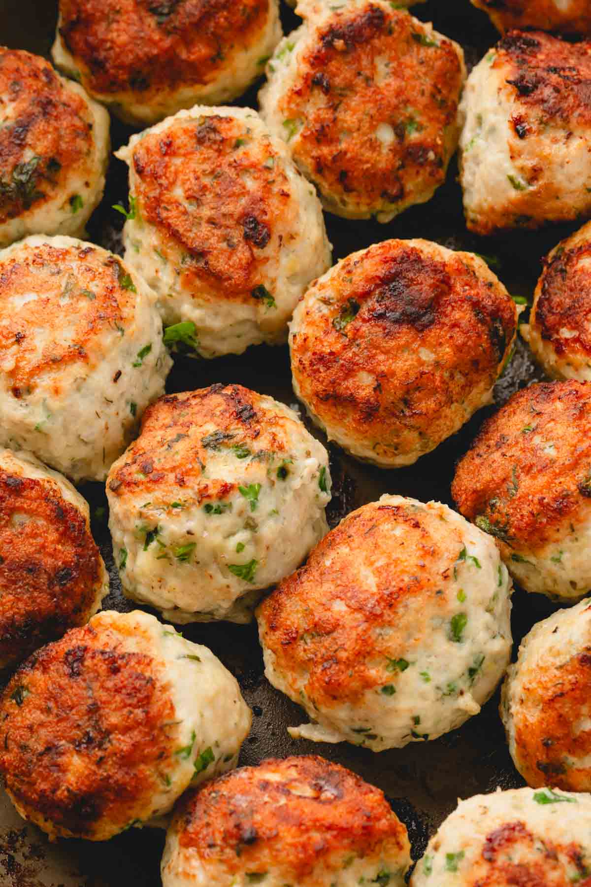 Close up image of greek chicken meatballs.