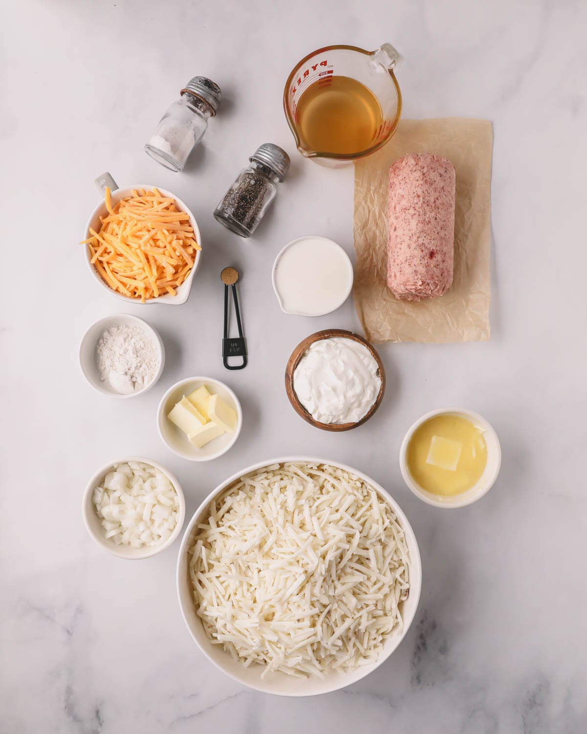 Ingredients for sausage and hash brown casserole.