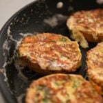 Savory french toast cooking in a pan.