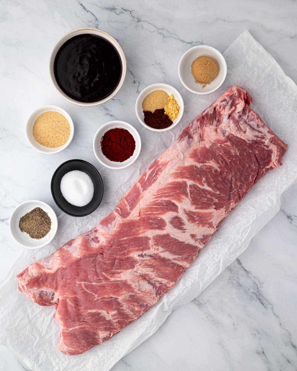 Ingredients for St. Louis-style ribs in the oven.