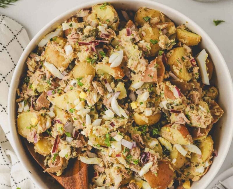 White bowl of tuna potato salad.