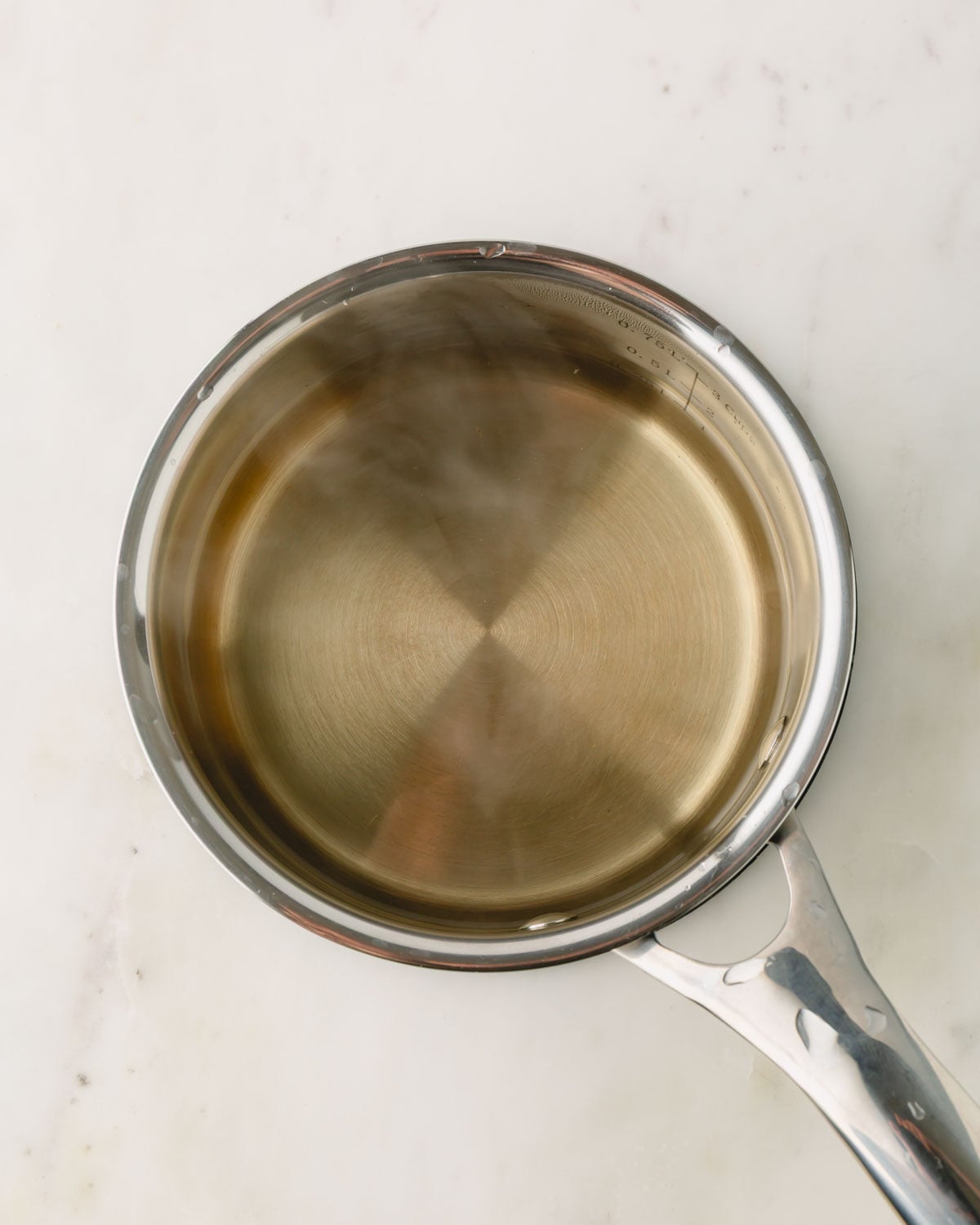 A saucepan of pickling liquid.