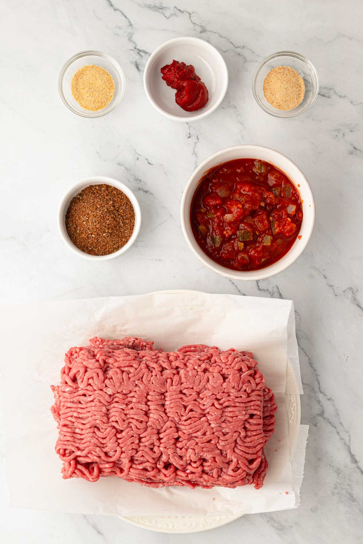 Ingredients for slow cooker ground beef tacos.