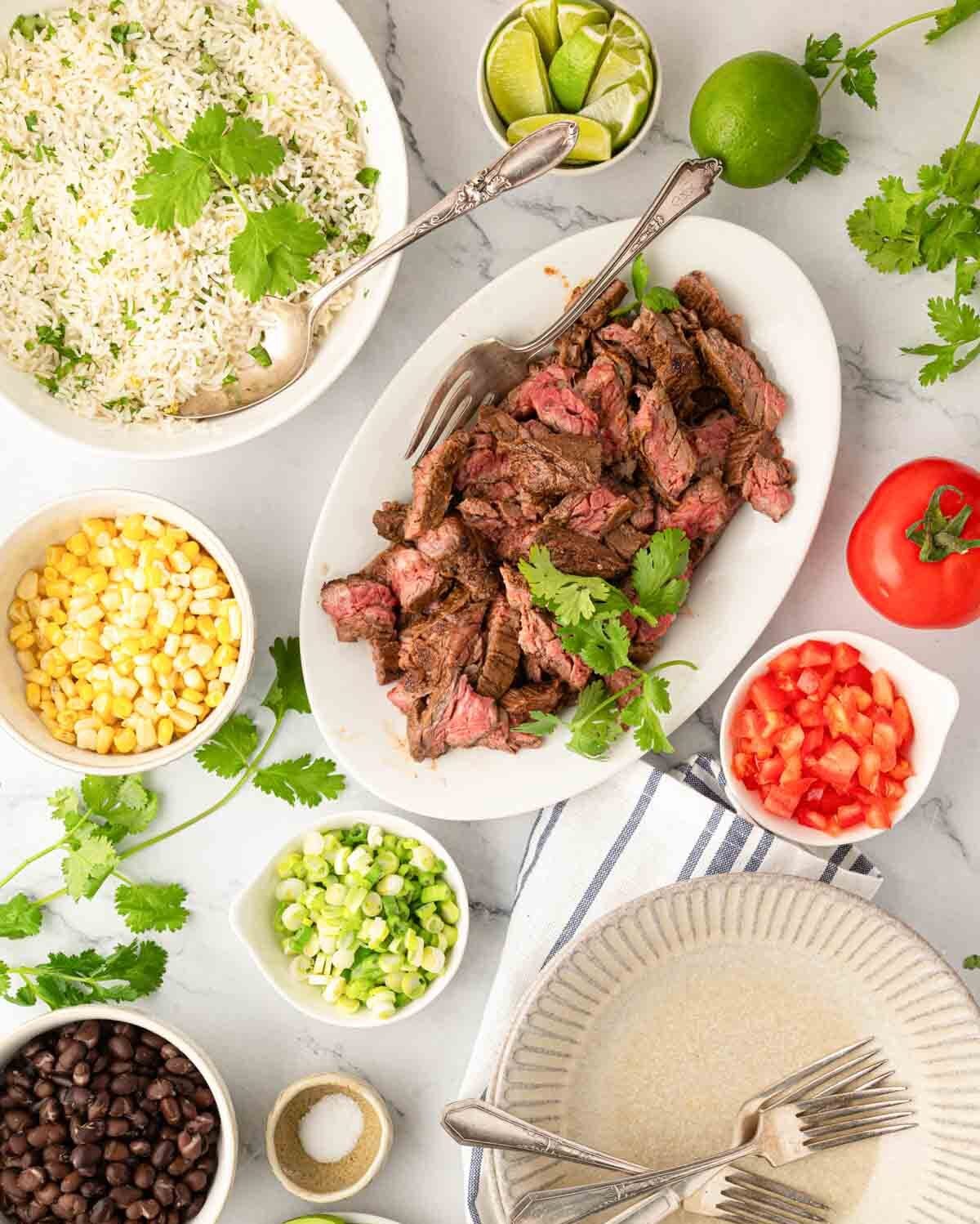 Overhead image of components for steak bowls.